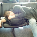 Passed out in the airport...exhausted from the tour