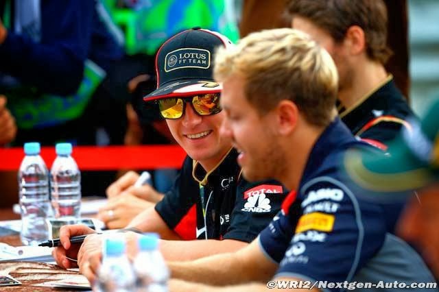Кими Райкконен и Себастьян Феттель на автограф-сессии Гран-при Кореи 2013