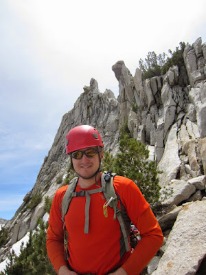 Aaron on the descent trail with the summit of Cathedral Peak above his head