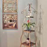 Minor Office 5 of 5 - The graceful etagere displays some of the client's awards.The bronze finish on the mirrors complements the etagere.
