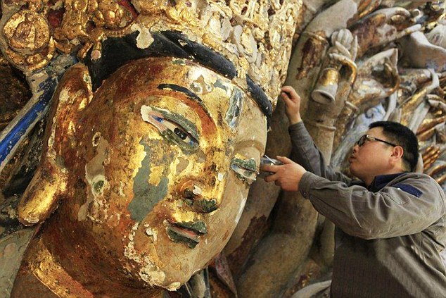 800-year-old Buddhist statue of 'goddess with thousand hands' restored to former glory 800-year-old Buddhist statue of 'goddess with thousand hands' restored to former glory
