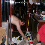 The shower is normally a storage space...Al has to clear it out to wash off that Def Leppard concert smell