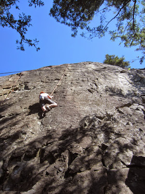 Alicia climbing Intimidator (5.10a)