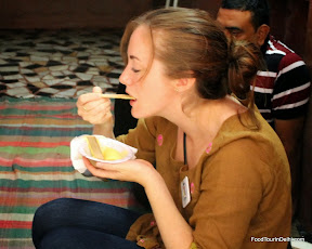 Eating kulfi http://indiafoodtour.com http://foodtourindelhi.com Eating kulfi http://indiafoodtour.com http://foodtourindelhi.com