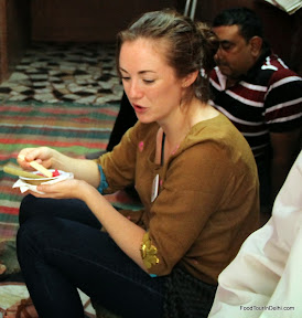 Eating kulfi http://indiafoodtour.com http://foodtourindelhi.com Eating kulfi http://indiafoodtour.com http://foodtourindelhi.com