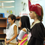 Performing helps our students gain confidence with public speaking. Here, a group of students is putting on a historical play for their peers.