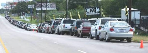 Cars lined up for groceries Cars lined up for groceries