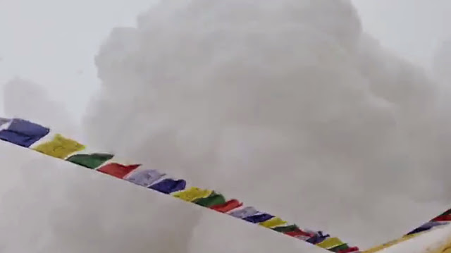 Clouds of snow and ice roar down Mount Everest.  Watch the stunning video below. (YouTube / Jost Kobusch)