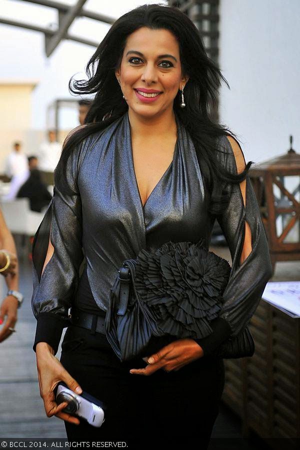 Pooja Bedi gets clicked during a party organised by Jimmy Choo to celebrate 'Women's Day', organised at Hotel Palladium. Pooja Bedi gets clicked during a party organised by Jimmy Choo to celebrate 'Women's Day', organised at Hotel Palladium.