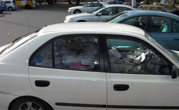car filled with loose rubbish