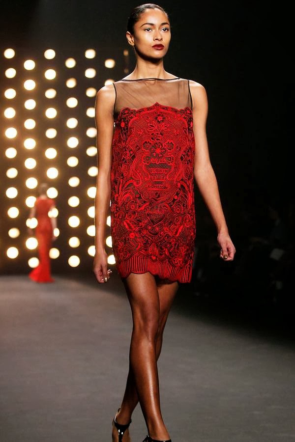 A model presents a creation by Naeem Khan Fall 2014 collection during New York Fashion Week February 11, 2014.
