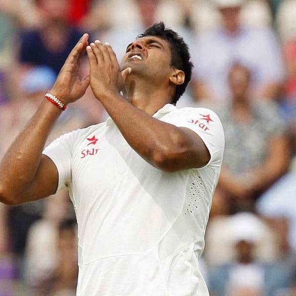 India's Pankaj Singh reacts whilst bowling during play on the first day of the third cricket Test match between England and India at The Ageas Bowl cricket ground in Southampton on July 27, 2014.