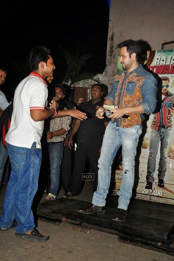 Emraan Hashmi gives away movie tickets of a recent Bollywood blockbuster to promote his upcoming film Raja Natwarlal at Gaitey, in Mumbai, on July 26, 2014. (Pic: Viral Bhayani) 