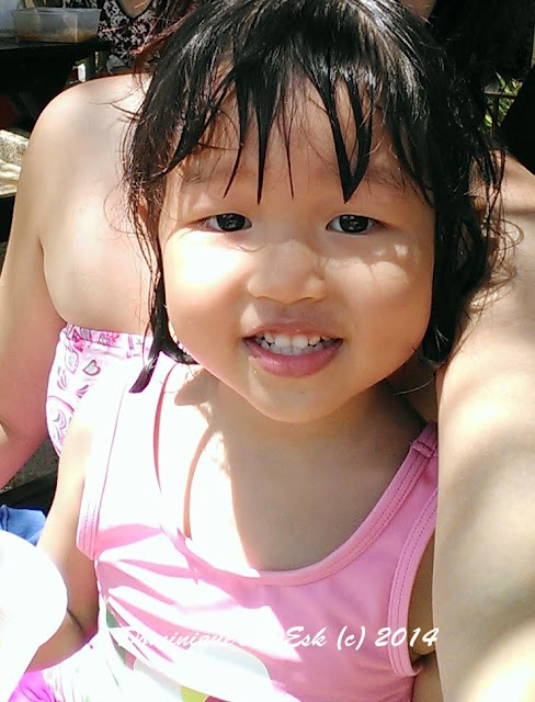 Tiger girl in her pink swimming costume