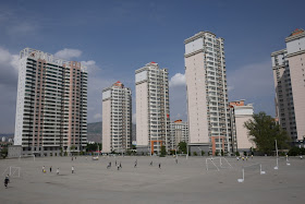 concrete sports field and apartment buildings in Xining, Qinghai