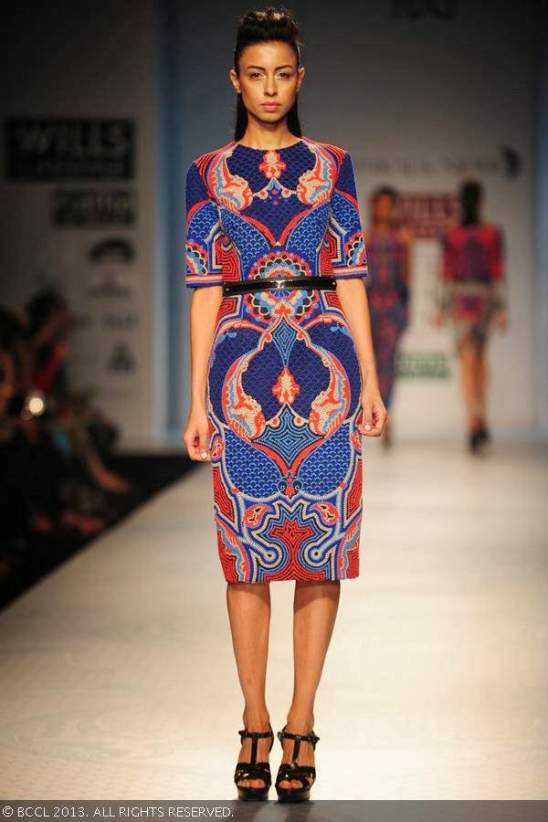 Sapna Kumar showcases a creation by designer duo Pankaj and Nidhi on Day 2 of the Wills Lifestyle India Fashion Week (WIFW) Spring/Summer 2014, held in Delhi.