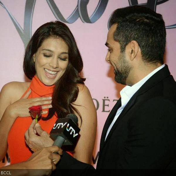 Abhay Deol gives a rose to his real-life girlfriend Preeti Desai as they arrive for Moet & Chandon's Valentine's Day party, hosted at Four Seasons in Mumbai.(Pic: Viral Bhayani)