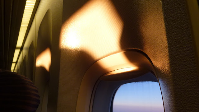 Dawn light reflecting off the aircraft interior