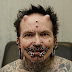 FRIGHTENING Photos Of The Worlds MOST PIERCED Man That Will Get You Go Like WTF As Hooks Buries Into His FLESH 