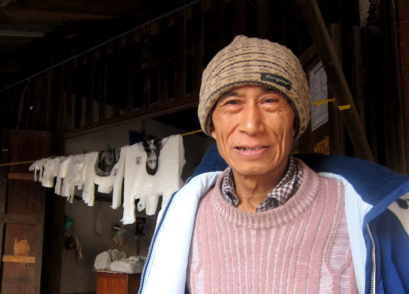 A merchant in a market in Myanmar