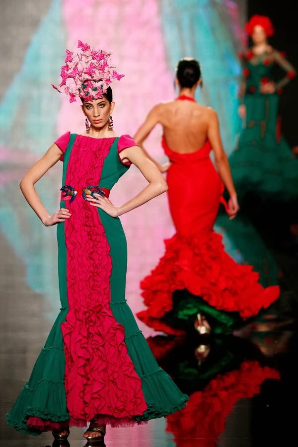 A model presents a creation by Antonio Gutierrez during the International Flamenco Fashion Show SIMOF in the Andalusian capital of Seville January 30, 2014.