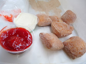 Tom Douglas' Dahlia Bakery Donuts, Fried to Order and come with Marscarpone and Strawberry Jam. They are light and pillowy and slighty warm, almost like beignets, but dusted more lightly with brown sugar and perfect for dipping into the fruity and sweet of strawberry and creamy of cheese
