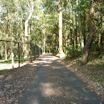 Metal ring fence beside a sealed trail in the Blackbutt Reserve (400186)