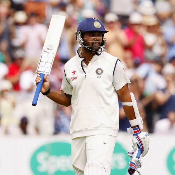 India's Murali Vijay walks back to the pavilion after his dismissal for 95 runs during the fourth day of the second Test cricket match between England and India, at Lord's Cricket Ground in London, England on July 20, 2014. 