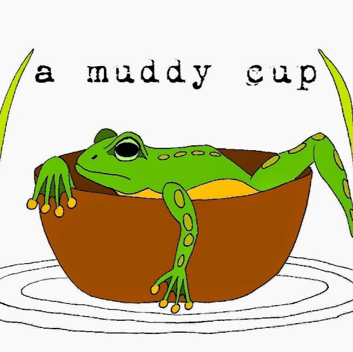A Muddy Cup Cafe' & Roastery logo