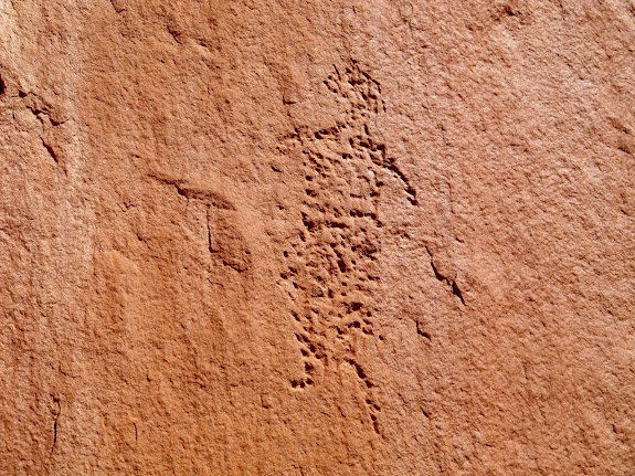 Petroglyph above the caves