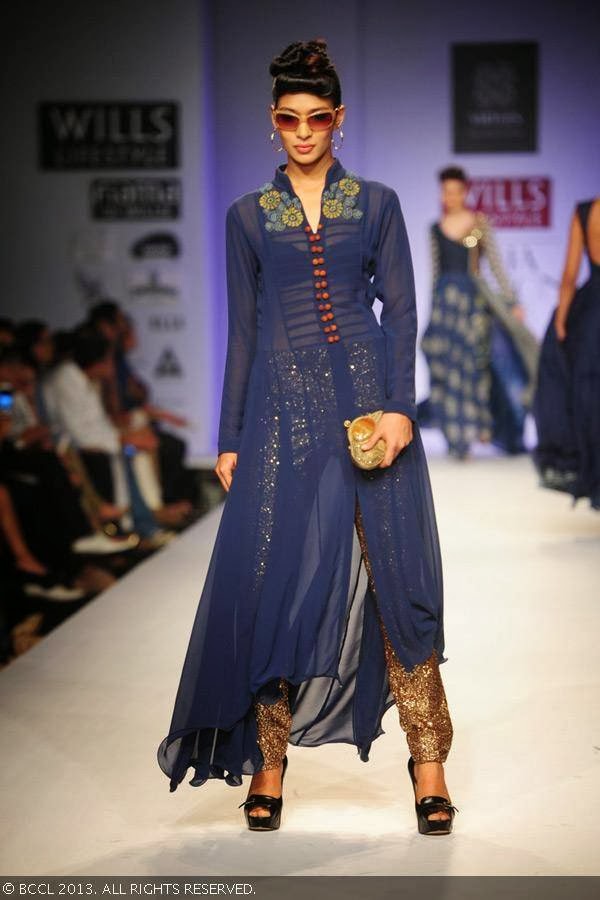 Nethra Radhuraman walks the ramp for fashion designers Ashish Viral and Vikrant on Day 5 of Wills Lifestyle India Fashion Week (WIFW) Spring/Summer 2014, held in Delhi.