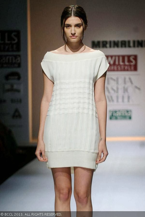 Marii showcases a creation by fashion designer Mrinalini on Day 3 of Wills Lifestyle India Fashion Week (WIFW) Spring/Summer 2014, held in Delhi.