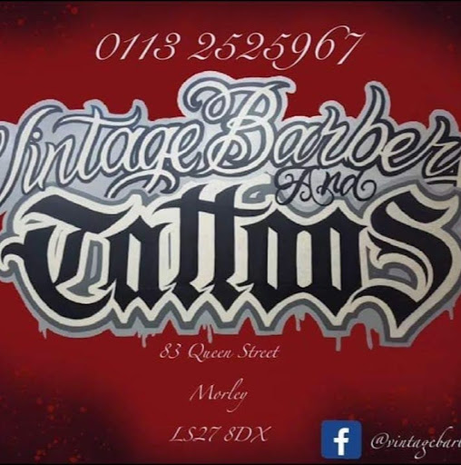 Vintage Barbers and Tattoos logo