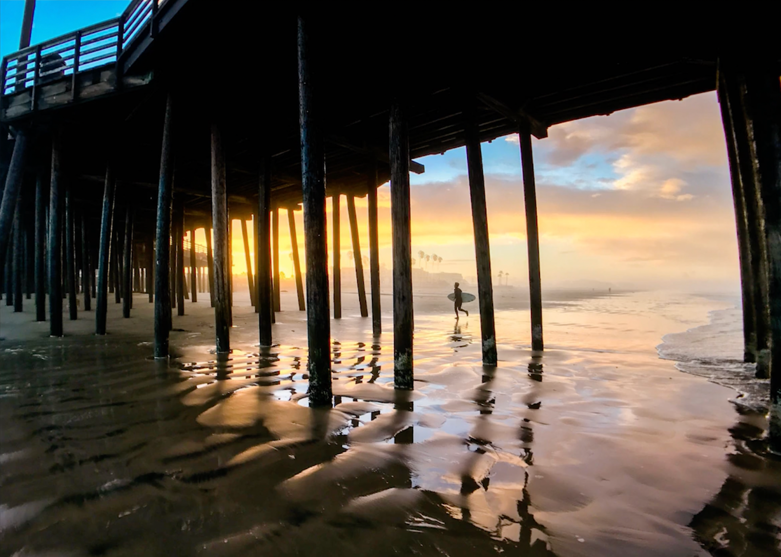 sunrise under ocean pier