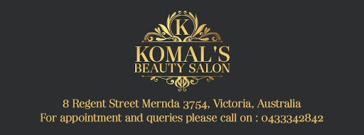 Komal's beauty Salon logo