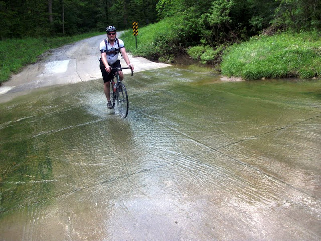 Adam riding a low water crossing