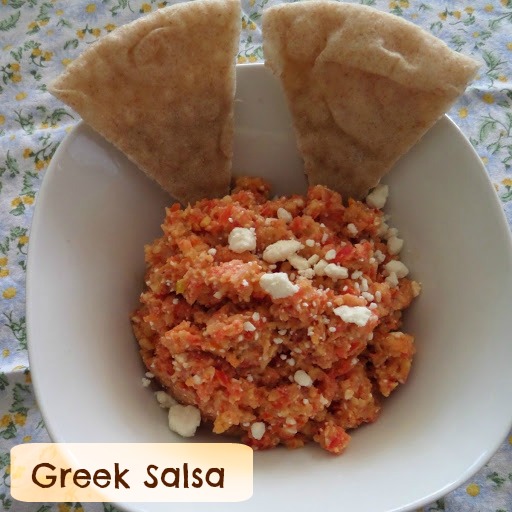 Greek Salsa:  Finely diced tomato, onion, cucumber, bell pepper, feta and garbanzo beans. A Greek salad in salsa form.