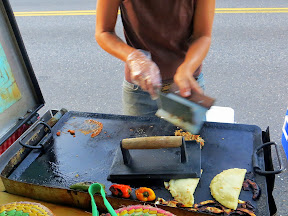 Working it for Google Experts Portland! Offerings of Taco Pedaler included Tacos: chicken, beef, pork or bean. Topped with cabbage, cilantro, and cotija cheese! Dillas: filled with potato, green chilis and cheese all simmered in a cheese beer sauce! Here you see Dillas in process on that little grill, which kept up with the crowd.