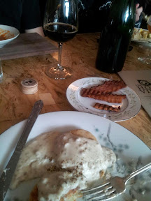 Brunch of champions at Hop and Vine: Block 15 Brewing Co. barrel aged beer goodness with  Gorgonzola Biscuits w/ Sausage-Black Pepper Gravy and a side of crispy bacon