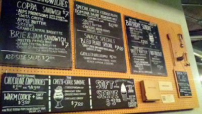 Cheese & Crack Snack Shop in Portland, on SE 28th just a few steps south of Burnside. This is their specials board, they also have a printed menu with more cheese delights