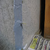 Prior to injecting a surface paste is applied over the foundation crack. This surface paste adheres the injection ports and keeps the concrete crack repair material inside the crack until cures. Then begin injecting at the bottom surface injection port.