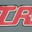 T R Flanagan logo