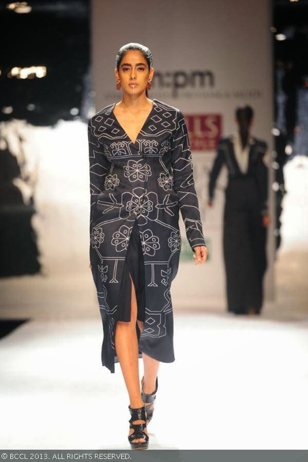 Diva walks the ramp for fashion designers Ankur Modi and Priyanka Modi on Day 2 of the Wills Lifestyle India Fashion Week (WIFW) Spring/Summer 2014, held in Delhi.
