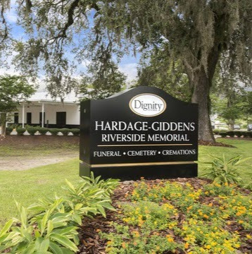 Hardage-Giddens Riverside Funeral Home & Riverside Memorial Park logo