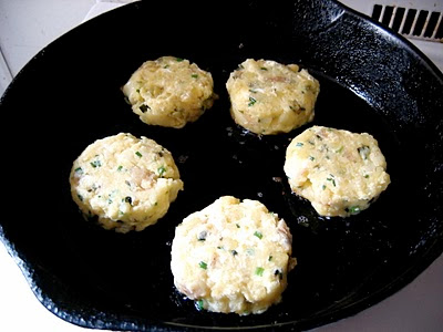 potato cakes in a pan cooking 