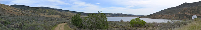 panorama from sign to canyon along water