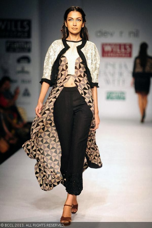 Sanea Sheikh walks the ramp for fashion designers Dev r Nil on Day 3 of the Wills Lifestyle India Fashion Week (WIFW) Spring/Summer 2014, held in Delhi.