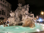 The Fountain of the Four Rivers - The Danube representation is on the left, gazing at the Obelisk, while the Ganges on the right holds an oar. The Fountain of the Four Rivers - The Danube representation is on the left, gazing at the Obelisk, while the Ganges on the right holds an oar.
