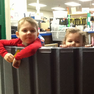 Christmas came early for the Children's Department of the Mifflin County Library. A child barrier was donated to help keep little ones from running away during story time. The child barrier, which attaches magnetically to the door frame, was used for the first time last night (Tuesday Dec 9) at the Polar Express Story Time. Pictured are Jaxon (age 4) and Josi (almost age 2) Berry whose grandparents donated the child barrier.