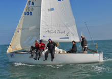 J/24 team- sailing off Cervia, italy in sailboat regatta